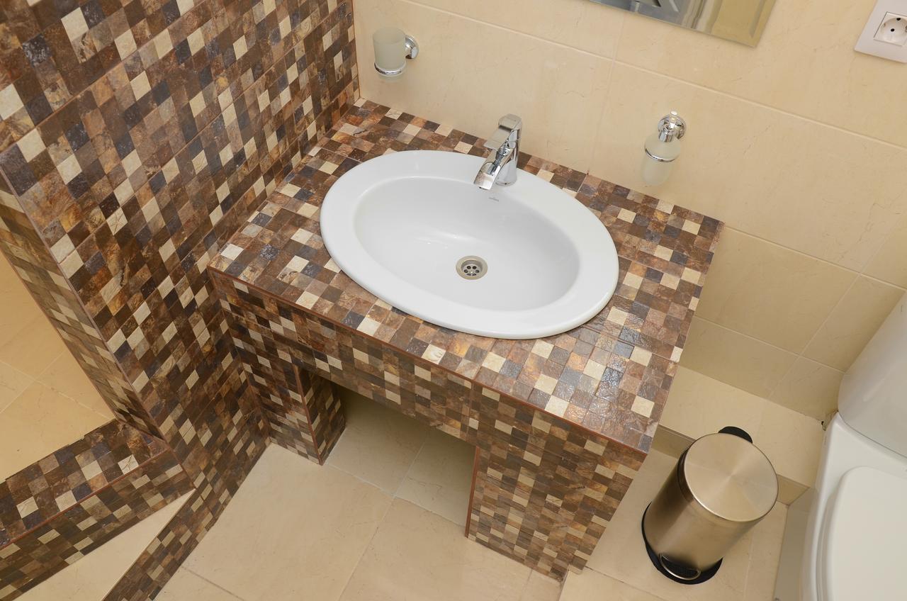 Captain Hotel Zatoka Ngoại thất bức ảnh